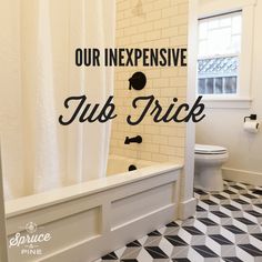 a bathroom with a black and white checkered floor, shower curtain, and tub