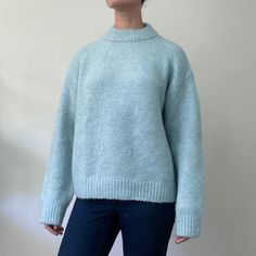 New With Tags, H&M Cozy And Warm Light Blue Mock Turtleneck Oversized Sweater. 90% Recycled Polyester, 5% Wool, 3% Alpaca, 2% Elastane Tag Reads Small, But Could Easily Fit A Medium. Machine Wash Cold, Gentle Cycle Bust: 47" Waist: 45" Length: 23" Sleeve (Pit To Wrist): 18" Oversized Blue Turtleneck Sweater, Blue Oversized Turtleneck Sweater, Blue Funnel Neck Sweater With Ribbed Cuffs, Cozy Blue High Neck Sweater, Casual Oversized Sweater By H&m, H&m Casual Oversized Sweater, Blue Sweater With Ribbed Collar For Layering, Oversized H&m Winter Tops, Blue Funnel Neck Sweater For Layering