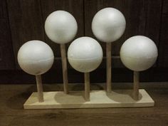 four white balls are placed on top of each other