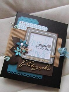 a close up of a card on a bed with white sheets and blue ribbon around it