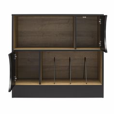 an open cabinet with three compartments and two spoons on the bottom one is black