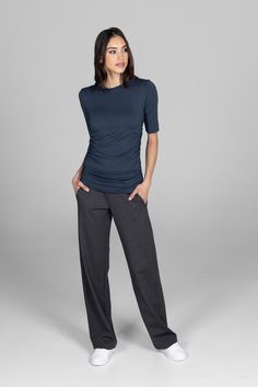 Why we love this: These grey Pants are the ultimate throw-on-and-go style that will take you anywhere and everywhere. Our Traveler Pant is an office-approved silhouette, keeps up with all of your adventures in a flattering, wrinkle-resistant fabric and supportive waistband & side pockets. Enhance your work ensemble with our impeccably tailored pants. Features: Travel-Tech Fabric: Wrinkle-resistant, 4-way stretch Supportive high-rise waistband Leg Opening: 20" Functional side pockets Made in USA Grey Yoga Pants, Travel Pants, Yoga Pant, Tailored Pants, Grey Pants, Yoga Tops, Elbow Length Sleeve, Tight Leggings, Tops For Leggings