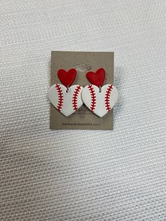 two white and red baseball heart shaped earrings