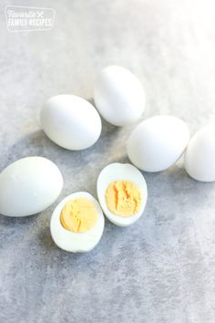 an image of hard boiled eggs on the counter with one broken egg in the middle