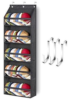 a rack that has several different items in it and is next to a pair of metal hooks