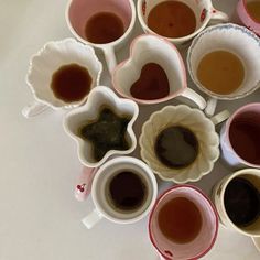 several cups filled with different types of liquid