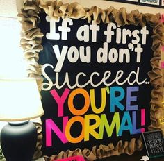 a sign that says if at first you don't success, you're normal