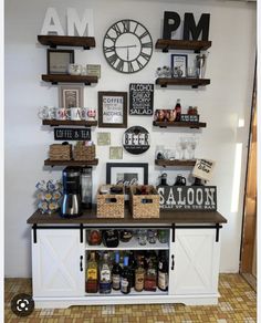 a room with shelves and various items on the wall next to a clock above it