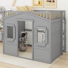 a child's bedroom with a loft bed and bunk beds