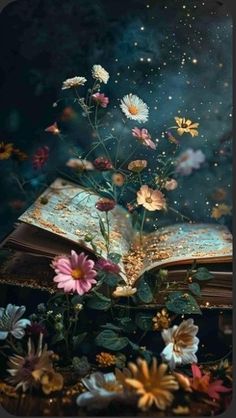 an open book with flowers floating out of it