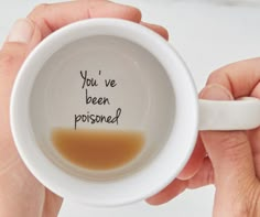 a person holding a coffee mug with the words will you be my maid of honor?