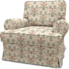 an upholstered chair with flowers on it