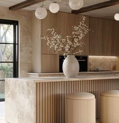 a kitchen with marble counter tops and stools