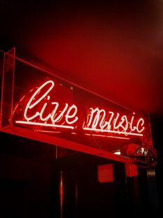 a red neon sign that says live music