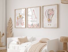 a bedroom with three pictures hanging on the wall