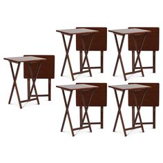 six small tables with wooden legs in various shapes and sizes, all side by side