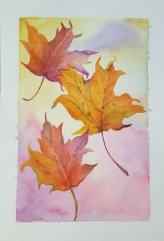 watercolor painting of three autumn leaves