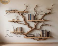 a book shelf with books on it and a tree branch hanging from the wall behind it