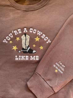 Embroidered brown crewneck with sleeve detail Cowboy Like Me, Brown Crewneck, Embroidered Crewneck, Live Taylor, Embroidered Hoodie, Long Live, Sleeve Detail