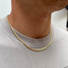 "Italian made 925 Sterling Silver Miami Cuban Chain plated with 23K Gold - Available 2mm / 3.5mm / 5mm DETAILS Thickness: 2MM / 3.5MM / 5MM Weight:  2MM - 18\" 5.03g / 20\": 5.8g / 22\": 6.3g 3.5MM - 18\": 13.6g / 20\": 13.91g / 22\": 15.91g - chain can very from between 3.3mm - 3.7mm - please be aware of this! 5MM - 18\": 27.9g / 20\": 29.89g / 22\": 34g If you are wondering why there is such a price difference in price; the weight is the main reason for this difference. The 3.5mm is more than double the weight of the 2mm chain. If you have any questions please message us :) Closure: Stamped Lobster Clasp Materials: Italian 925 Sterling Silver / 23Kt Gold Plating Adjustable 5cm's included Link Style: Miami Cuban Packed in a Twistedpendant Jewellery Pouch SIZING This chain is available in Male Gold Chain, Men’s Gold Chain Pendent, Gold-plated Cuban Link Chain Jewelry, Cuban Chain Men, Cheap Men's Gold Chain Necklace, Gold-tone Cuban Link Chain With Adjustable Detail, 18k Gold Chain, Mens Gold Bracelets