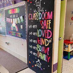 a classroom door with the words in this classroom safe loved and kind of brave we are family