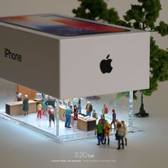 an apple box with people standing around it