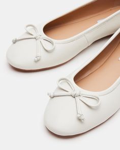 Elevate your shoe collection with the VIXEN ballet flats. With a charming bow detail at the front and a rounded toe, these flats offer a classic and feminine touch to any outfit. These comfortable flats provide both style and durability. Perfect for adding a chic and versatile staple to your wardrobe. .25 inch heel height Leather upper material Synthetic lining Synthetic sock Synthetic sole Imported White Ballerina Flats, White Ballet Flats, White Flat Shoes, Cute Flats, White Flat, Womens Ballet Flats, Comfortable Flats, Leather Ballet Flats, White Flats