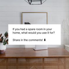 a desk with a laptop on it and a sign that says if you had a spare room in your home, what would you use it for?