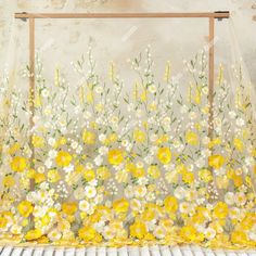 yellow and white flowers on a sheer curtain