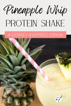 a pineapple whip protein shake in a glass with a straw sticking out of it