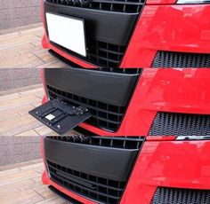 the front grilles of a red car with black grill guards on it's sides