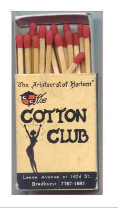 an open box of matches with the words cotton club written on it in black and red