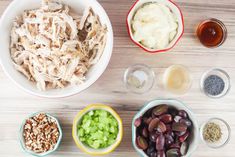 bowls filled with different types of food on top of a table