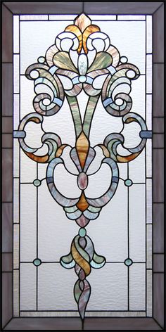 a stained glass window with an ornate design