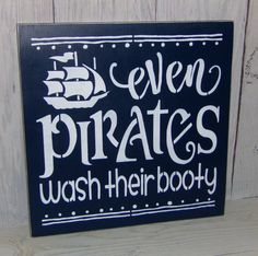 a sign that says even pirates wash their boots