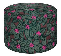 a large green and pink flower covered ottoman