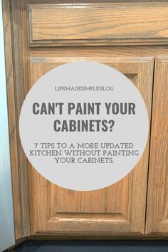 a kitchen cabinet door with the words can't paint your cabinets?