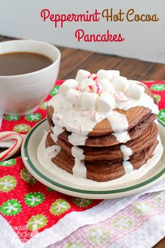 peppermint hot cocoa pancakes with marshmallows on top