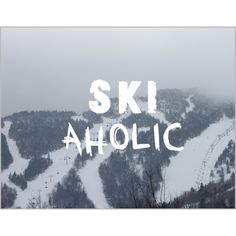 the words ski aholic written in white on a snowy mountain