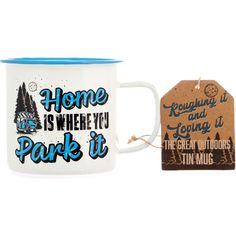 two mugs with tags on them sitting next to each other, one has a tag that says home is where you park it