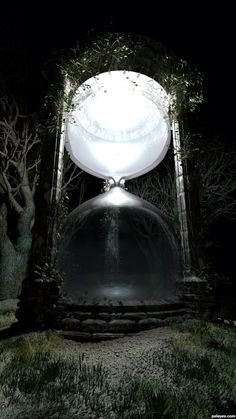 a large white object sitting on top of a lush green field