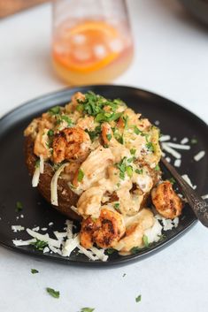 a black plate with some food on it