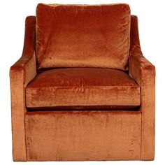 an orange velvet chair on a white background