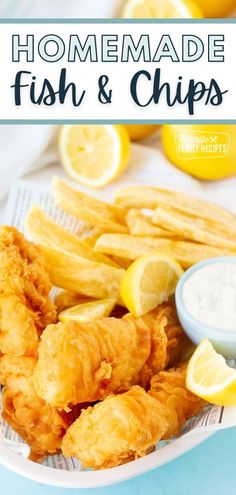 fried fish and chips on a plate with lemon wedges next to the recipe text reads homemade fish and chips