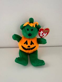 TY Halloweenie Beanie Tricky the Bear is in excellent condition! The perfect Halloween Gift or addition to Halloween Decorations.  Thanks for shopping with me! ✨Your Beanie Baby will be shipped in 1 business day. ✨All Beanie Babies include a tag protector - more can be found for purchase in my shop. ✨All shipping is tracked! ✨Etsy's shipping estimates are not guaranteed. I appreciate your patience if your package takes longer than expected from Canada! 🛫 ✨Questions? Happy to answer! Feel free to send me a message! 😍 ✨Thank you for supporting my shop! 🌸 Halloween Parfait, Halloween Bar, Beanie Babies, Beanie Baby, Bear Toy, Stuffed Toy, The Bear, Halloween Gift, Etsy Shipping