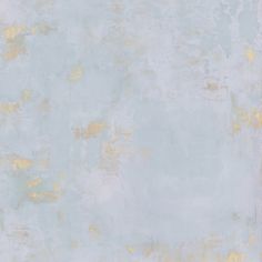 an abstract painting with yellow and blue paint on the wall, as if it were painted in pastel colors