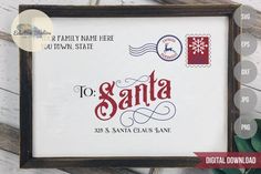 a wooden framed sign with the words santa written on it