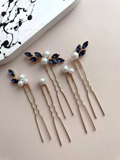 Introducing our exquisite elegant bridal hair pin set, a collection of 5 stunning pearl-adorned hair pins designed to elevate your wedding day or special occasion ensemble. Crafted from top-tier materials including crystal rhinestones, lustrous pearl beads, and silver-plated jewelry wire, these high-quality hair pins exude sophistication and timeless allure. Each blue hair pin is meticulously assembled to enhance your hairstyle with grace and elegance, ensuring a radiant and refined look. Custom Blue Hair Pins, Navy Blue Hair, Bridal Hair Pins Pearl, Hair Pins Wedding, Hair Pins Bridal, Blue Hair Accessories, Bridesmaid Hair Pins, Accessories Pearl, Bridal Hair Piece