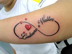 a person with a tattoo on their arm that says water, love and bradleys