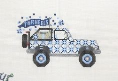 a cross stitch pattern of a blue truck